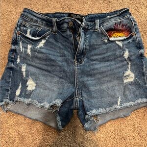 Judy Blue Medium Wash Distressed Denim Shorts with Sunrise Patch